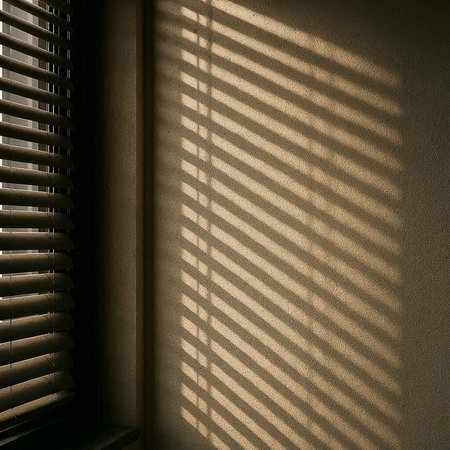 Sunlight through the blinds on the window. Abstract background.