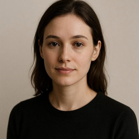Portrait of a young woman in a black T-shirt.