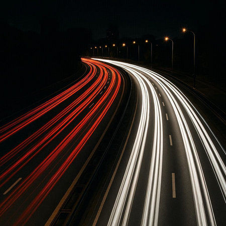 Car light trails on the road at night. Long exposure photo.