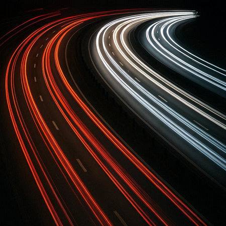 lights of moving cars at night. long exposure red, blue, green