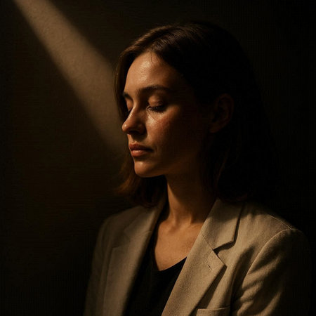 Portrait of a young woman in a beige jacket on a dark background