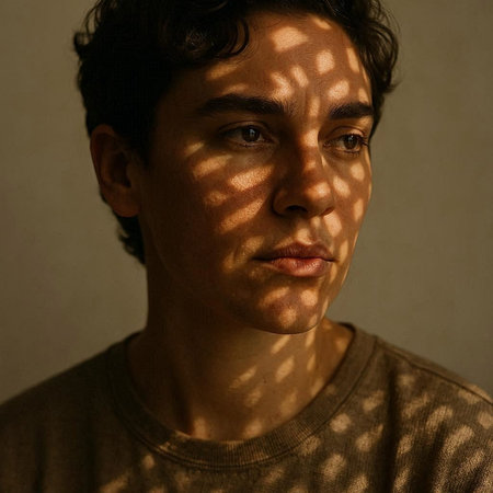 Portrait of a young man with blinds on his face.
