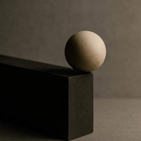 Abstract composition with a sphere on a black background. Minimalism.