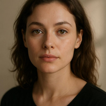 Portrait of a beautiful young woman with brown hair and freckles