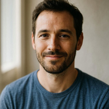 Portrait of a handsome man with a beard and mustache looking at the camera