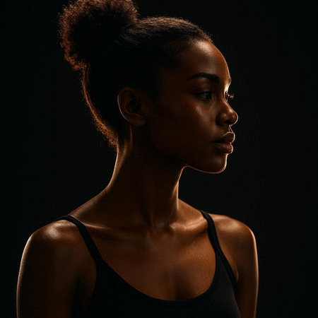 Side view portrait of young african american woman on black background