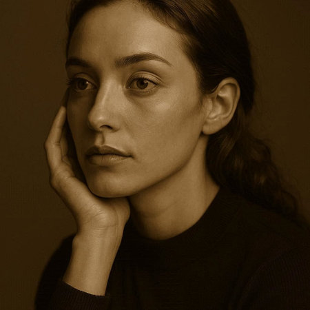 Portrait of a beautiful woman on a dark background. Toned.の写真素材