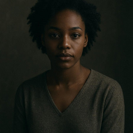 Portrait of a beautiful young african american woman on dark background