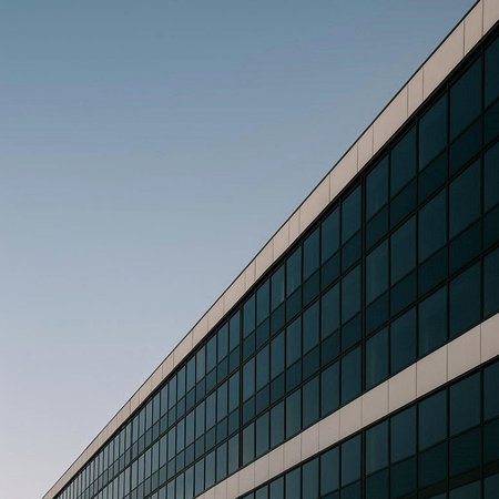 modern office building with blue sky in the background, retro toned