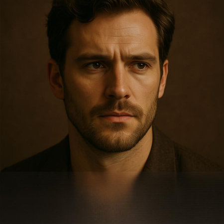 Portrait of a handsome man with a beard on a dark background