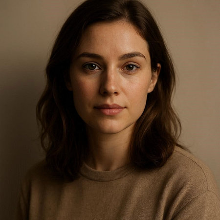 Portrait of a beautiful young woman with brown hair and brown sweater