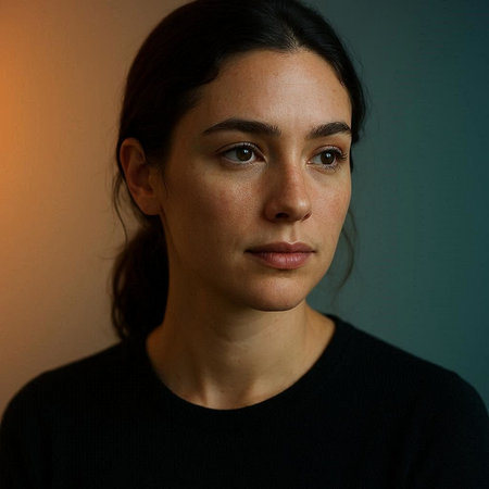 Portrait of a beautiful young woman in a black t-shirt