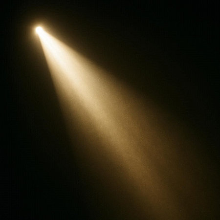 Spotlights on a black background, illuminated by the rays of light