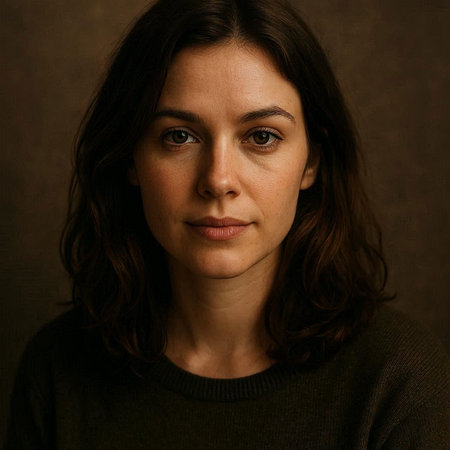 Portrait of a beautiful young woman with brown hair. Studio shot.