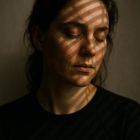Portrait of a young woman with blinds on her face.