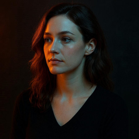 Portrait of a beautiful young woman in a black t-shirt