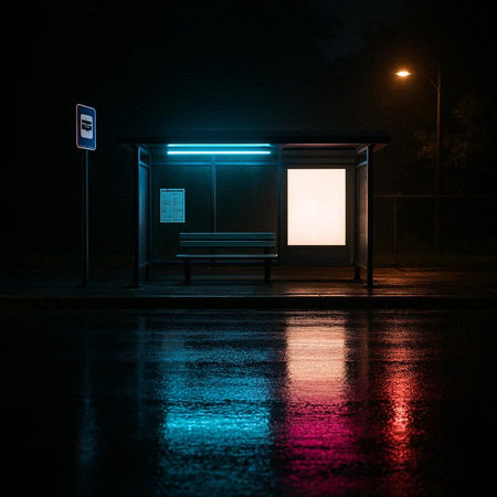 Empty bus stop at night with neon lights. Empty bus stop at nightの写真素材