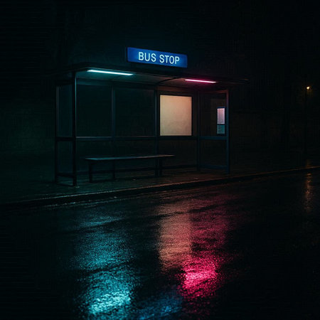 Illuminated bus stop at night with blue and red lights.