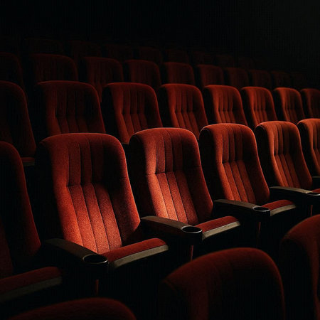 Cinema auditorium with rows of red seats. 3d renderの写真素材