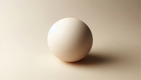 White egg on a beige background. View from above. Close-up