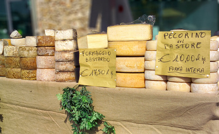 typical italian cheese Pecorino on a market stall