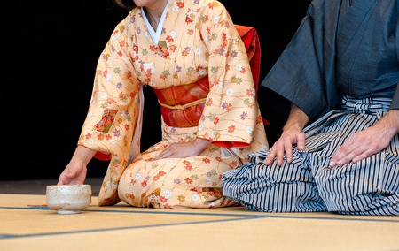 Man and woman during the tea ceremonyの写真素材
