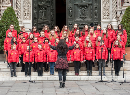 Florence, Tuscany, Italy - January 6, 2018: The children of the Pomegranate Chorus singing on the...