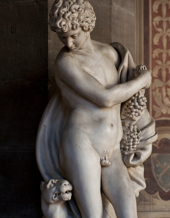 Florence, Italy - 2018, July 1: ? ?? Bacchus and Panther?? white marble statue (Florentine art, 16th century), from the Medici granducal collection. It is located at the Bargello Museum, in Florence, Italy.のeditorial素材