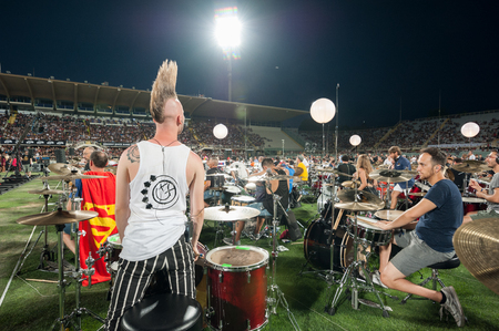 Florence, Italy - 2018, July 21: Hundreds of drummers at the city arena during the ? ?? Rockin? ?? 1000 - That? ?? s Live?? , the biggest rock band in the world.のeditorial素材