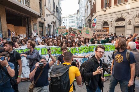 Florence, Italy - 2019, September 27: People crowds the city streets during the Global Climate Strike For Future Event.のeditorial素材