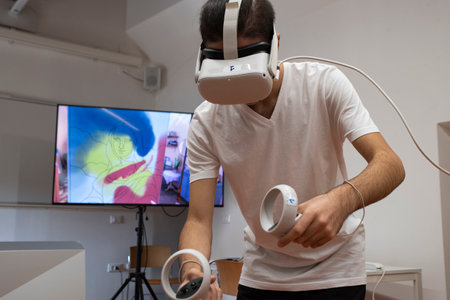 Pisa, Italy - 2023, October 8: Boy having fun using VR virtual reality equipment.
