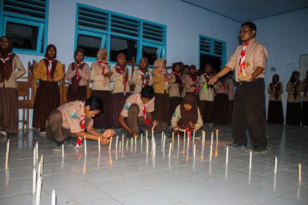 Nganjuk, Indonesia - 27 July 2023 : Scout camp, bonfire. bonfire camp at Indonesian scout camp at nightのeditorial素材