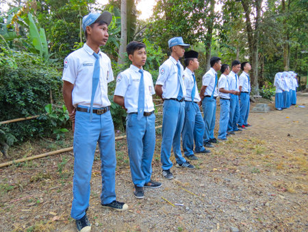 Nganjuk, Indonesia - July 27, 2023 : High school students perform the Republic of Indonesia independence flag ceremony at schoolのeditorial素材