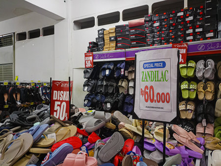 Kediri, Indonesia - July 15 2023 : Sandals on display at retail in a shop that is having a discountのeditorial素材