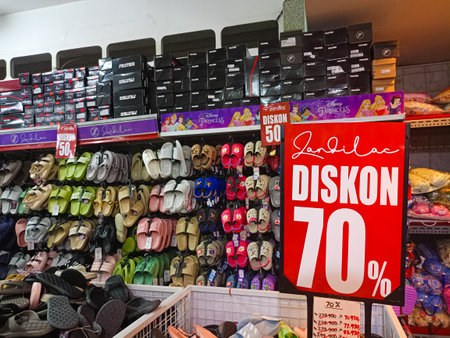 Kediri, Indonesia - July 15 2023 : Sandals on display at retail in a shop that is having a discountのeditorial素材
