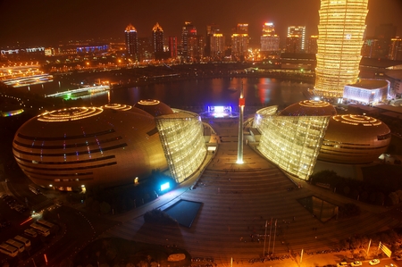 October 13, 2015, the night scene of ZHENGDONG New District's modern buildings, including Henan Art Center, Zhengzhou conferences exhibitions hotel. In central China's Zhengzhou City, a prime ministers' meeting of the Shanghai Cooperation Organization SCOのeditorial素材