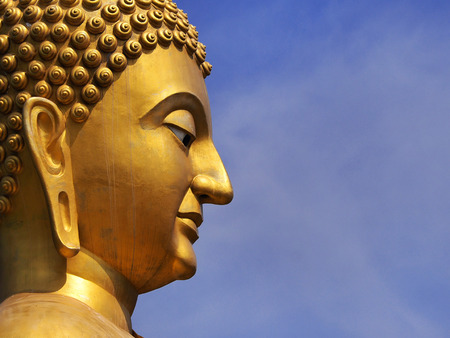 Close up the face of Bhuddha Sculpture in Makha Bucha Memorial Park in Nakhon Nayok, Thailand 2016の写真素材