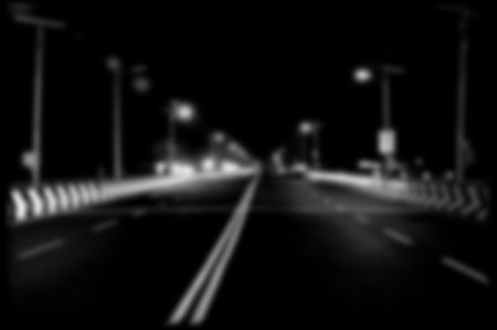 Blurred of car on road at night. Abstract background for design.