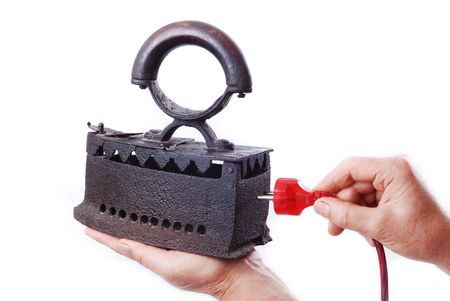 Usefull tool in hands, old iron and cableの写真素材