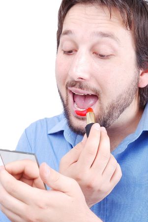 Young man with a beard is putting make-upの写真素材