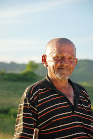 An ugly man with red interesting faceの写真素材