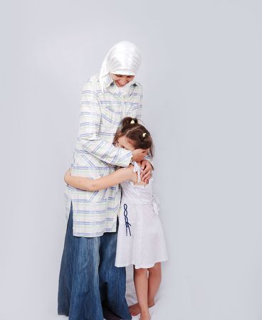 A young muslim woman in traditional clothes in education processの写真素材