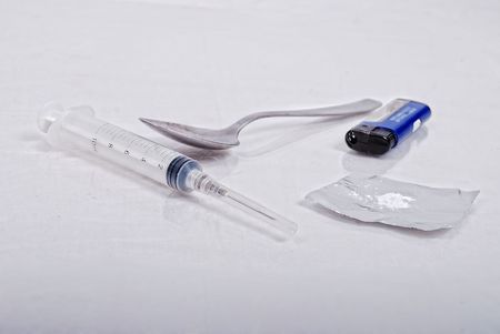 Drugs addict activities and some tools on tableの写真素材