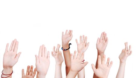 Many children hands high up isolatedの写真素材