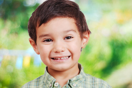 Cute funny boy with surprised face isolated