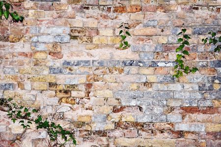 An old and characteristic wall, colorful brickwallの写真素材