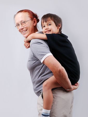 Elderly woman with her little grandsonの写真素材