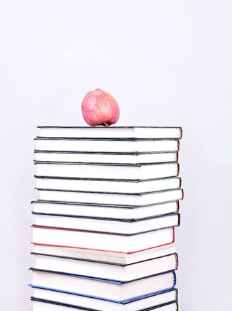 Many books with an apple onの写真素材