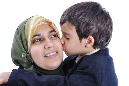 Muslim woman kissing her sonの写真素材