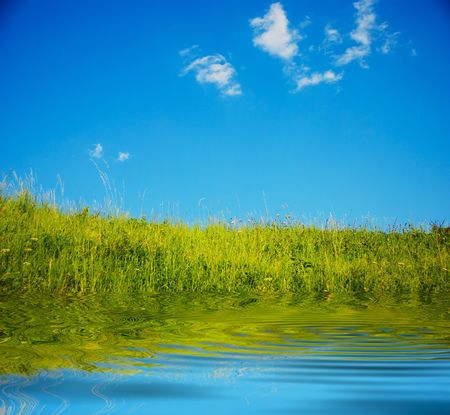  An image of blue sky and green fieldの写真素材
